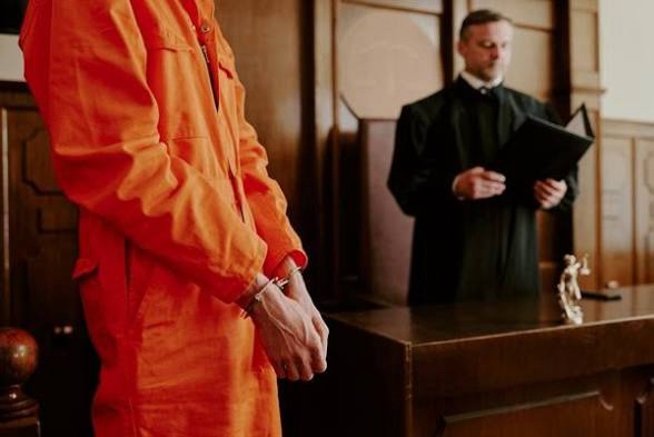 Criminal defense gavel and handcuffs